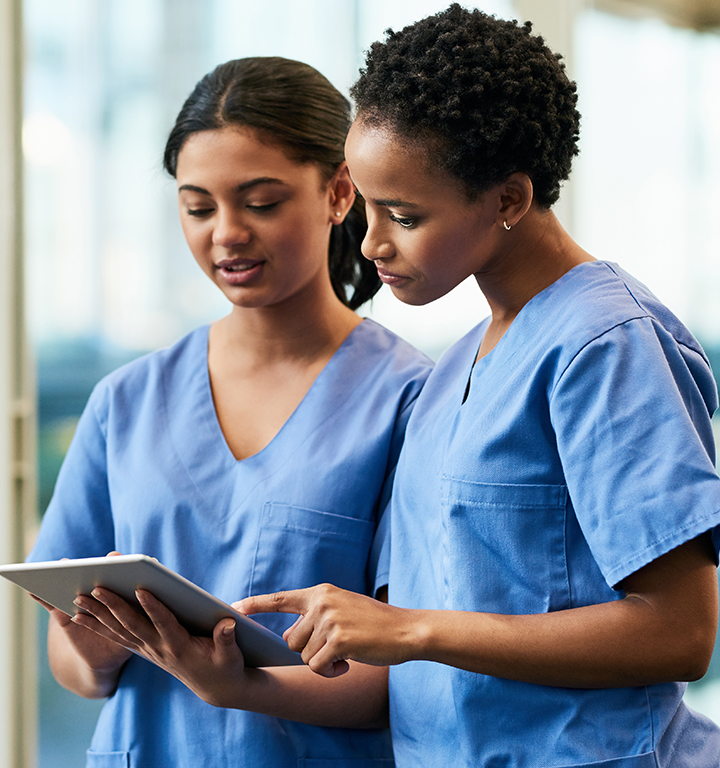 Image of a nurse with travel bags illustrating travel nursing.
