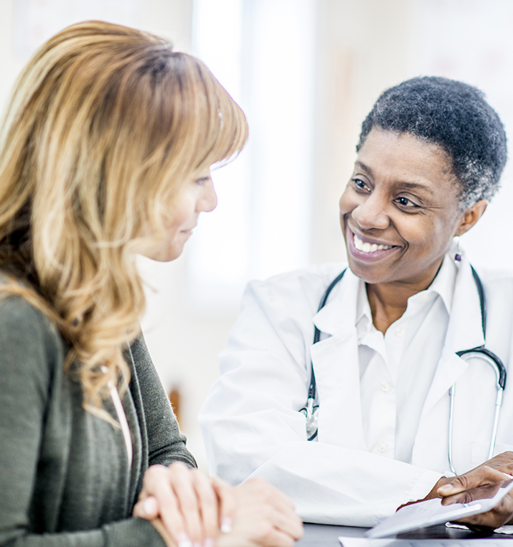 Visual of a healthcare professional interacting with patient engagement tools