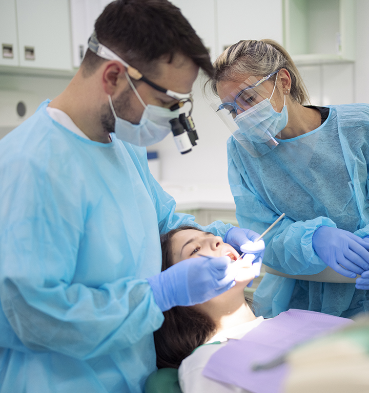 Dental claims visual with dentist tools and charts.